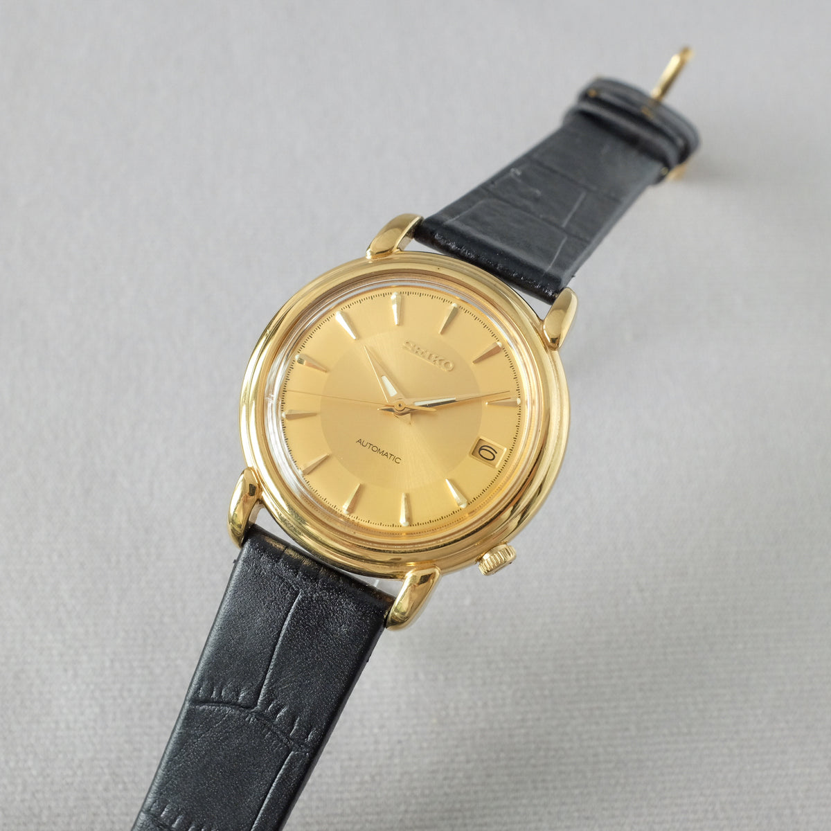 セイコー メンズ 自動巻き 7002‐8010 黒文字盤 金色モデル